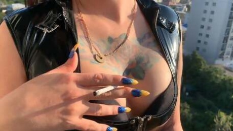 Smoking fetish. Dominatrix Nika seduces you and smokes a cigarette sexually in front of the camera.