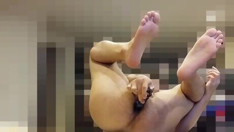 Fucking my ass with a dildo with sexy feet display